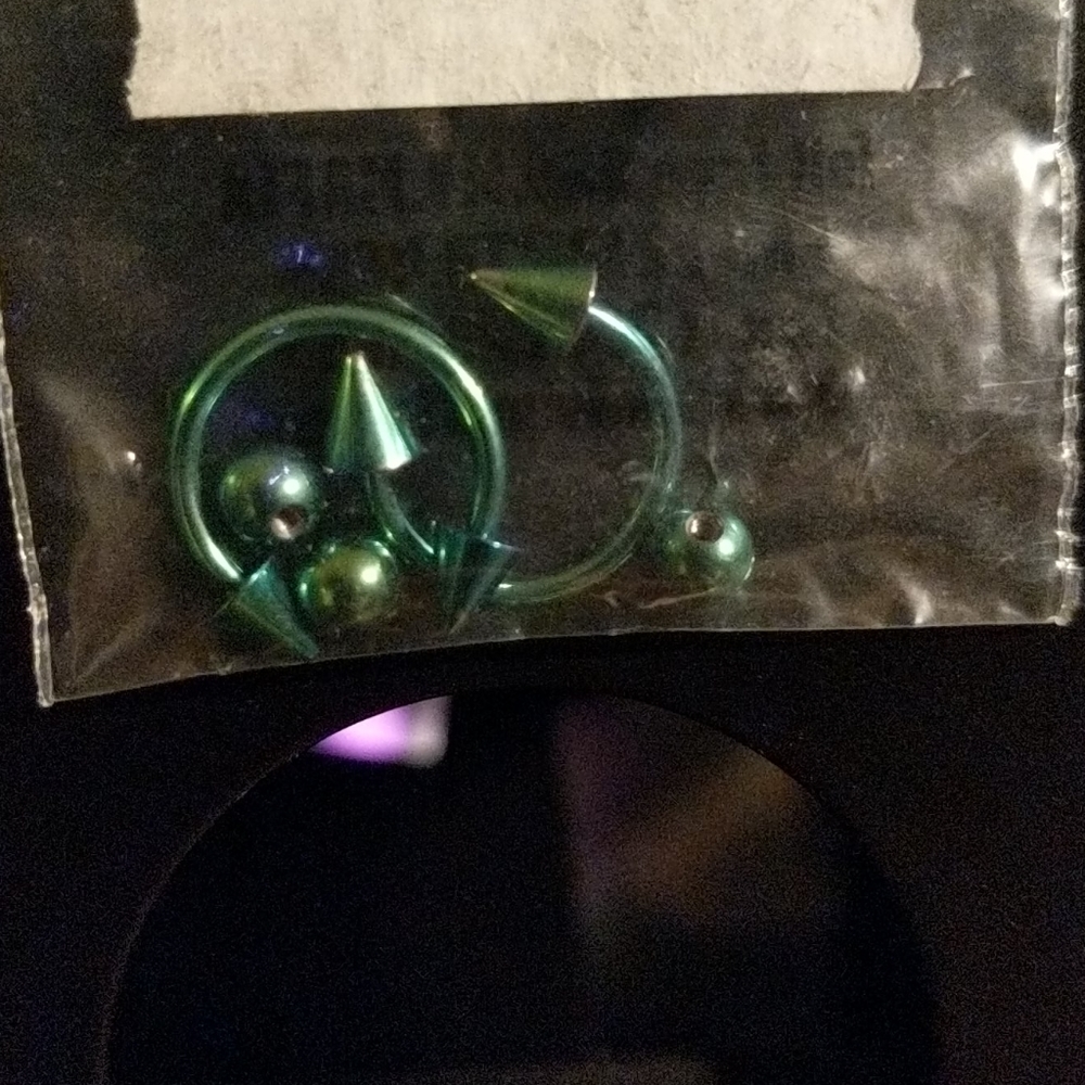 Two 14g green horse shoes with 3 balls & 4 spikes